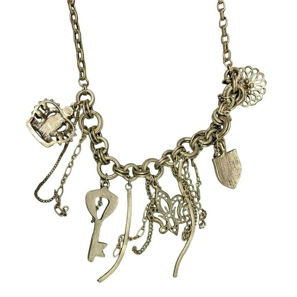 Steampunk Waterfall Charm Necklace With Key, Shield, Crown and Fleur-De-Lis Char - Picture 7 of 9